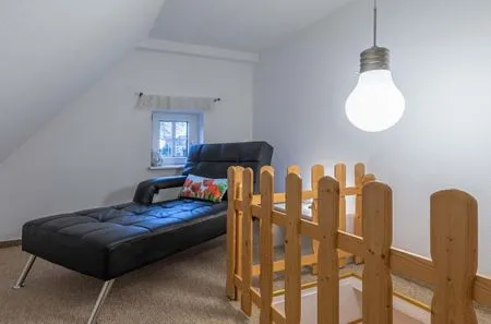 Ferienwohnung Rohrdommel Flur mit Couch  Rohrdommel