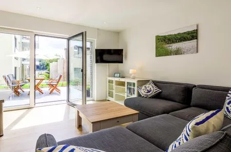 Ferienwohnung Nordlicht in Malchow offener Wohnbereich mit Zugang zur Terrasse  Nordlicht