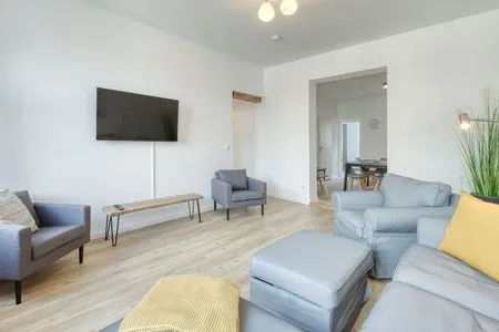 Ferienwohnung Family Suite Wohnbereich mit TV  Family Suite