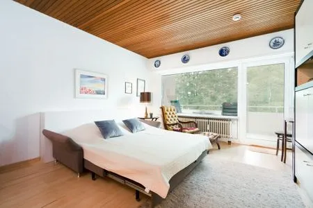 Wohnzimmer Sonnige Ferienwohnung im Kapitäns-Stil