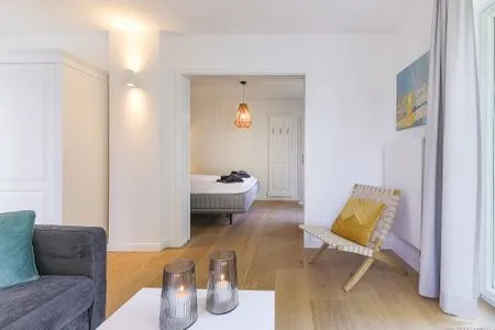 Wohnzimmer Haffperle Meerblau - zentral in Haffkrug, nur wenige Schritte zum Strand