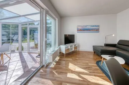 Ferienwohnung Eddi Waren (Müritz) - Wohnbereich und Wintergarten  Eddi