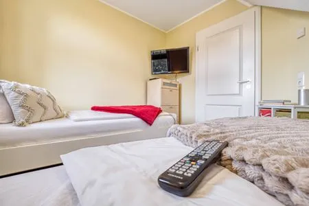 Schlafzimmer mit zwei Einzelbetten Mühlenstrasse 23 - Wohnung Boddenstern