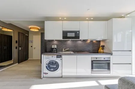 Ferienwohnung Lüttkoje Ostseebad Wustrow - ZweiWasser Alte Seefahrtschule Küche  Lüttkoje