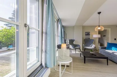 Ferienwohnung Lüttkoje Ostseebad Wustrow - ZweiWasser Alte Seefahrtschule Wohnzimmer  Lüttkoje