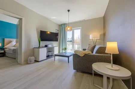 Ferienwohnung Swantovit Ostseebad Wustrow - ZweiWasser Alte Seefahrtschule Wohnzimmer  Swantovit