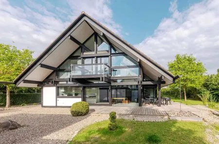 Ferienhaus HUF-Haus in Waren (Waren Müritz) Außenansicht vom Haus mit Balkon  HUF-Haus