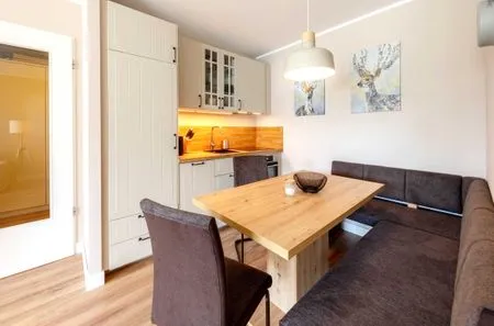 Ferienwohnung Aparthotel Zingst Heymat - Kochnische mit Sitzgruppe  Heymat