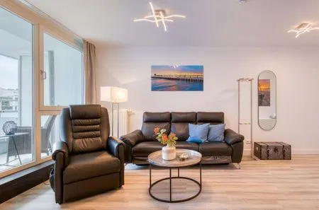 Ferienwohnung Ostseeglück Aparthotel Zingst - Sitzgruppe im Wohnzimmer  Ostseeglück