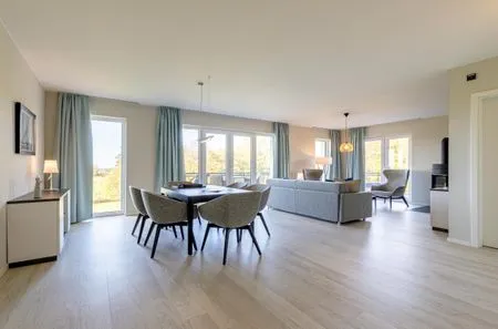 Ferienwohnung Strandlaeufer Ostseebad Wustrow ZweiWasser Alte Seefahrtschule Helles Wohnzimmer  Strandlaeufer