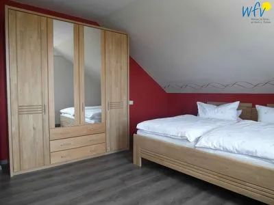 Schlafzimmer Ferienhaus Kiebitzdelle-Leegde 10 Ferienwohnung Backhaus
