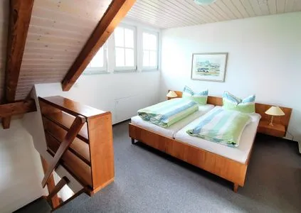 Schlafzimmer ABC Ferienwohnungen Maisonette-Wohnung B1****