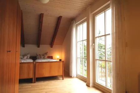 Schlafzimmer ABC Ferienwohnungen Maisonette-Wohnung B2****