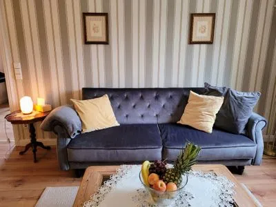 Bequemes Sofa im Wohnzimmer Ferienwohnung Ratssaal