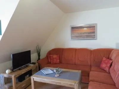 Wohnzimmer Seeschlößchen Ferienwohnung 7