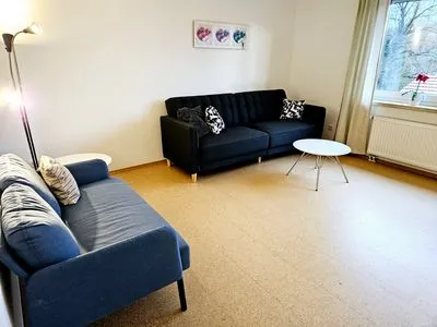 Wohnzimmer Ferienwohnung "Ampermoos"