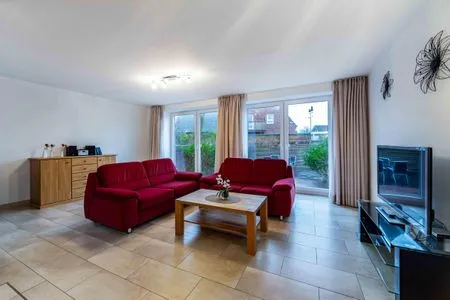 Wohnzimmer Haus Dünenrose Ferienwohnung Octopus