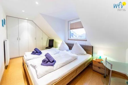 Schlafzimmer Huus an de Tune Ferienwohnung Fidellapje