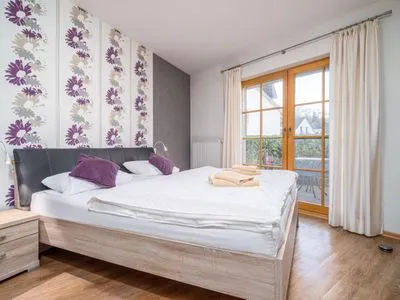 Schlafzimmer mit Doppelbett Ferienpark Freesenbruch Wohnung 2.1 - Möwennest
