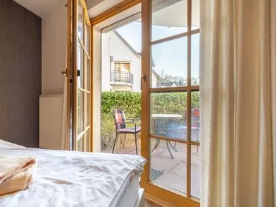 Schlafzimmer mit Doppelbett Ferienpark Freesenbruch Wohnung 2.1 - Möwennest