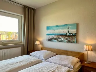 Schlafzimmer Ferienwohnung im Haus Nordland App 43