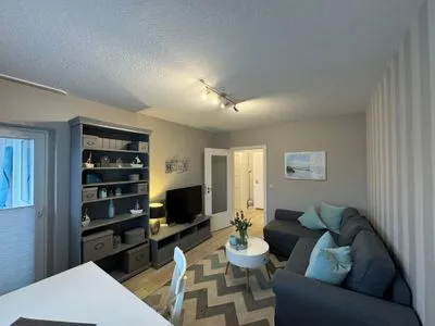 Wohnzimmer Ferienwohnung im Haus Nordland App 118 (Hund)