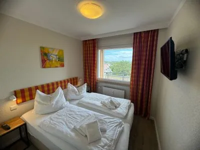 Schlafzimmer Ferienwohnung im Haus Nordland App 88