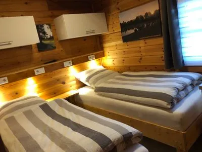 Schlafzimmer Marlies - Lastering Ferienhäuser & Apartments