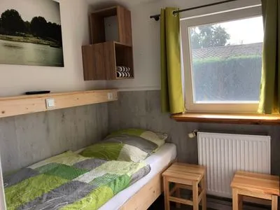 Schlafzimmer Mathilde - Lastering Ferienhäuser & Apartments