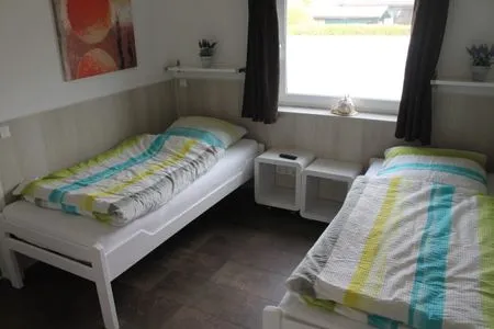 Schlafzimmer Weidenbruch - Lastering Ferienhäuser & Apartments