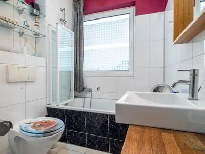 Badezimmer mit Badewanne  Ferienwohnung Ohana
