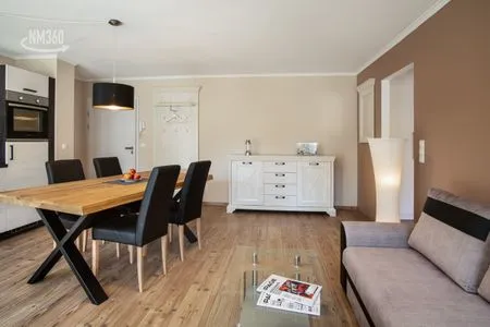 Wohnzimmer App. 10 mit Terrasse, Privatstrand