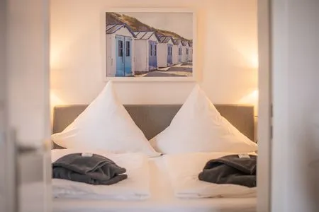 Bett Meerhafen - mit eigenem Strandkorb im Herzen vom Niendorfer Hafen