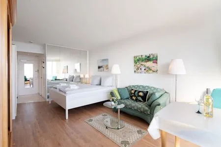 Wohnzimmer, Sofa, Couch, Bett Ferienwohnung "Meerblick App. 805"