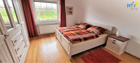 Schlafzimmer Fuhrmannshof Ferienwohnung Cassen