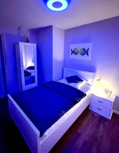 Schlafzimmer mit Einzelbett Parkresidenz am Hafen Wohnung HF 12 - "Luftsnapper´s"