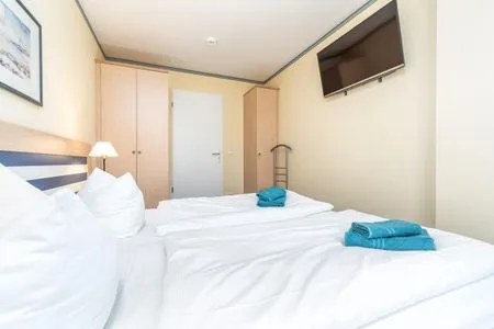 Schlafzimmer mit Doppelbett  Villa Kurpark - Wohnung 512