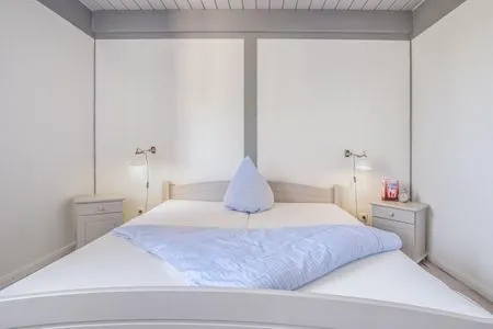 Schlafzimmer Ferienwohnung Deich & Chill Pellworm