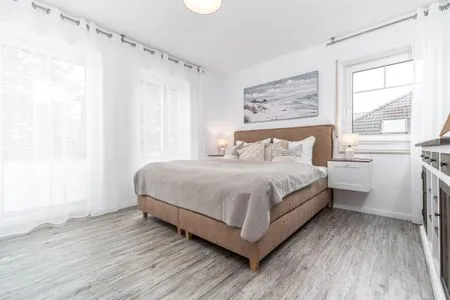 Schlafzimmer mit Doppelbett Parkresidenz am Hafen Wohnung HF 23 - "Viento"