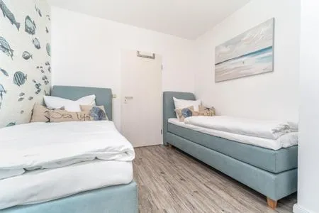 Schlafzimmer mit zwei Einzelbetten Parkresidenz am Hafen Wohnung HF 23 - "Viento"