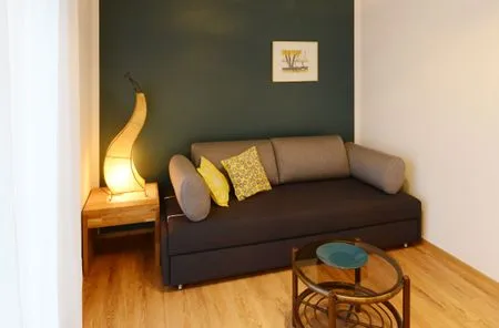 Wohnzimmer Apartment Gartenblick 7/5 EG mit überdachter Terrasse barrierefrei