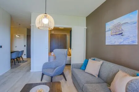 Ferienwohnung Boddenlümmel Ostseebad Wustrow - ZweiWasser Alte Seefahrtschule Wohnzimmer  Boddenlümmel