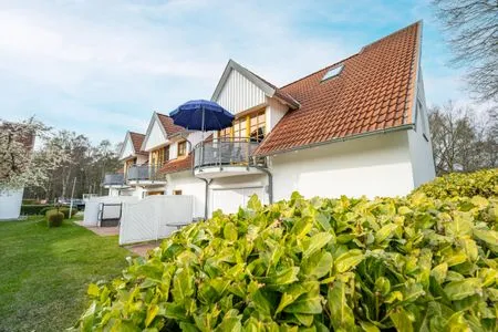 Rückseite vom Haus Ferienpark Freesenbruch Wohnung 3.4 - Zum Zeesenboot