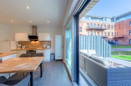 Ferienwohnung Sebastian Malchow - Essbereich mit Zugang zur Terrasse  Sebastian