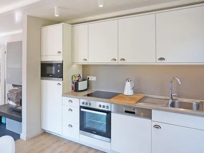 Küche im Ferienhaus Steuerbord in Süddorf auf Amrum Haus *Strandweg 8* Friesenhaushälfte *Steuerbord*