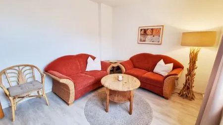 Wohnzimmer Ferienwohnung "Achtern Diek 2" 1. Reihe an der Ostseeküste