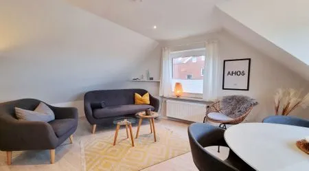 Wohnzimmer Ferienwohnung "Achtern Diek 3" 1. Reihe an der Ostseeküste