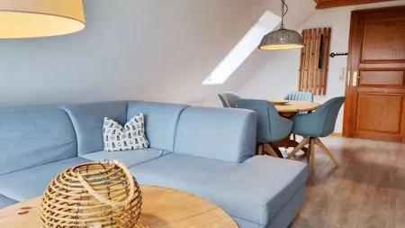 Wohnzimmer Ferienwohnung "Achtern Diek 4" 1. Reihe an der Ostseeküste