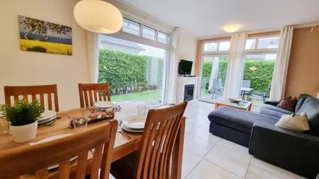 Wohnzimmer Ferienwohnung "Baltic Sunrise" mit Garten an der Ostseeküste