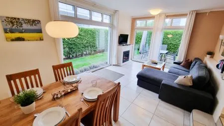 Wohnzimmer Ferienwohnung "Baltic Sunrise" mit Garten an der Ostseeküste